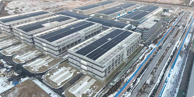 Aerial view of modular data center buildings with rooftop solar